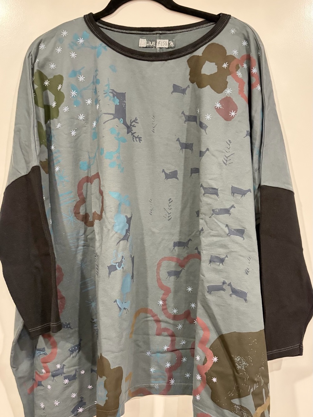 Blue Fish Women's Long Sleeve Graphic Top in Slate Blue and Black